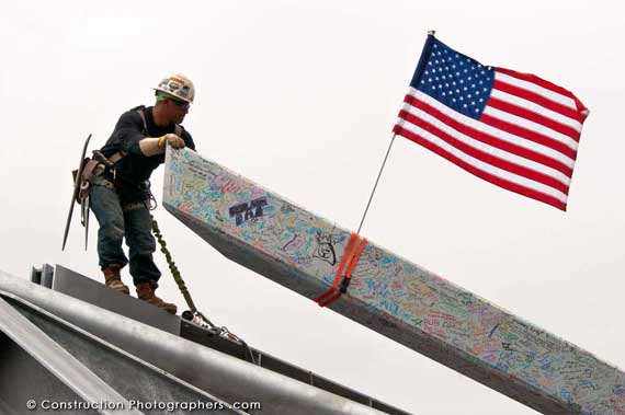 The last giant steel beam is being placed on top of the new UC Berkeley art museum construction during a public topping off ceremony. Visitors have been invited to sign the beam as a sort of time capsule for the future.